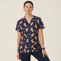 NNT CATUXV Xmas Gingerbread Surfer Print Scrub Top
